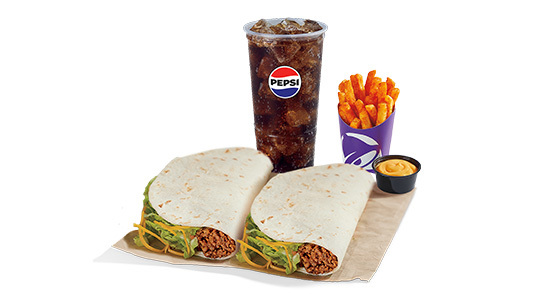 2 beef soft tacos with a side of fries and cheese sauce, plus a soda.