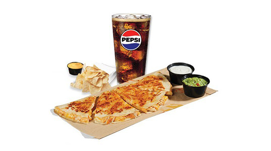 A chicken quesadilla with cups of sour cream and guacamole, plus a side of corn tortilla chips with cheese sauce plus a soda.