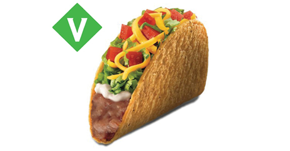 A hard shell taco filled with refried beans, sour cream, lettuce, diced tomato, and cheese. Vegetarian.