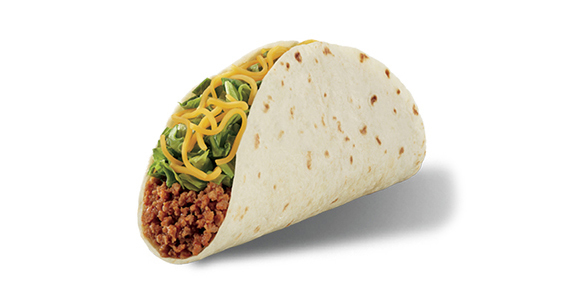A soft shell taco filled with ground beef, lettuce, and cheese.