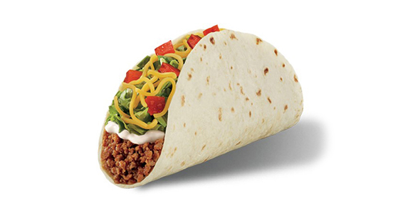 A soft shell taco filled with ground beef, sour cream, lettuce, cheese, and diced tomato.