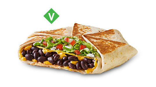 A hexagonal folded tortilla sandwich filled with black beans, cheese sauce, lettuce, tomato, and sour cream. Vegetarian.
