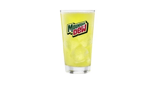 A glass of sickly yellow soda with the new Mountain Dew logo on it.