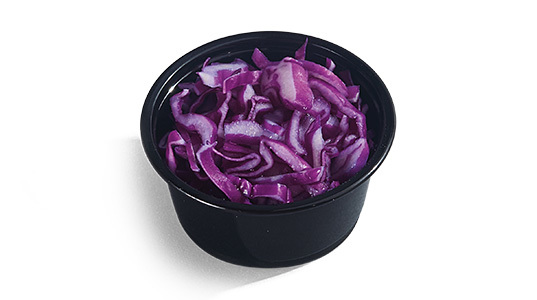A dipping sauce cup filled with sliced purple cabbage.