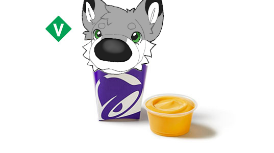 A fry cup filled with a folf who is looking up at you expectantly, with a cup of cheese sauce next to it.